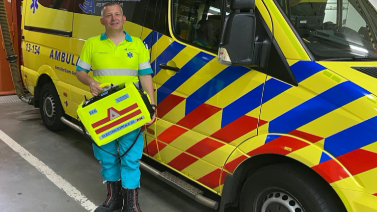 Ambulance staff member holding electra stroke case