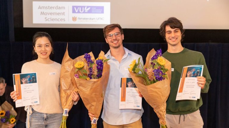 Andi Shi (l), Moritz Eggelbusch and Michel de Haan (r), winners of the Poster Awards