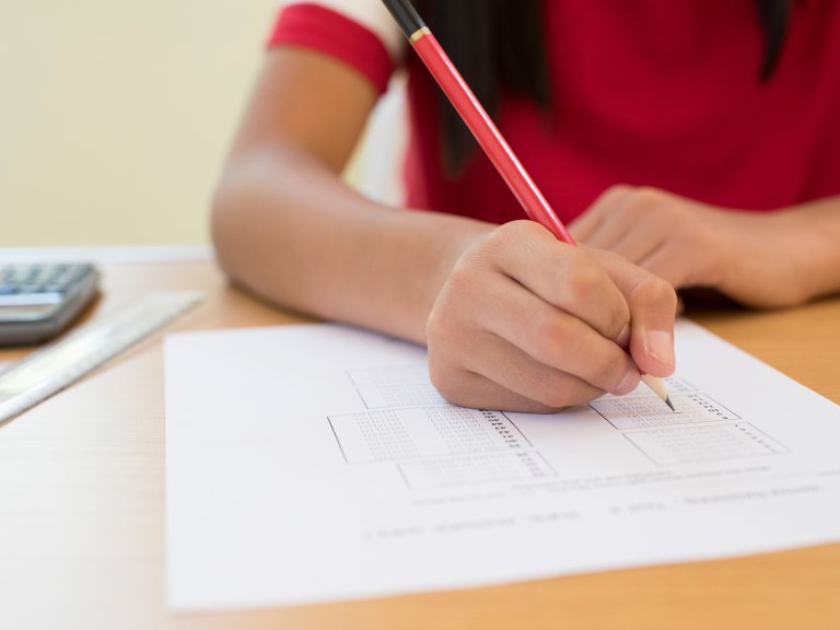 Children born after induced labour score lower in school tests 12 years later 